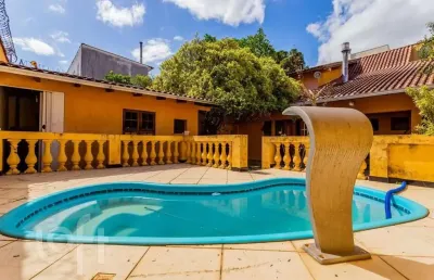 Casa com 2 quartos à venda na rua afonso rodrigues, 263, jardim botânico, porto alegre, 194 m2 por r$ 1.150.000