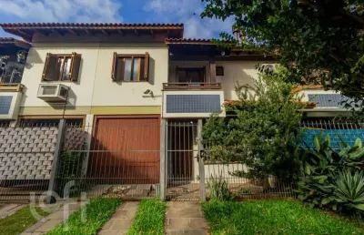 Casa em condomínio fechado com 3 quartos à venda na rua itapitocaí, 1031, cristal, porto alegre, 105 m2 por r$ 430.000