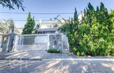 Casa com 3 quartos à venda na rua alcebíades antônio dos santos, 550, nonoai, porto alegre, 399 m2 por r$ 1.790.000
