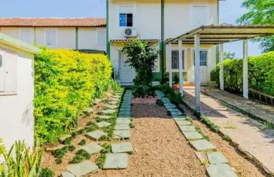 Casa com 2 quartos à venda na avenida juca batista, 3527, hípica, porto alegre, 127 m2 por r$ 304.000