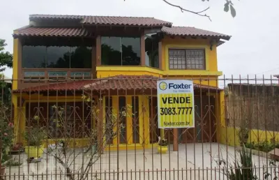Casa com 2 quartos à venda na rua marquês do maricá, 505, vila nova, porto alegre, 250 m2 por r$ 1.015.000
