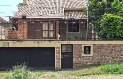 Casa com 3 quartos à venda na avenida deputado aramy silva, 277, santa tereza, porto alegre, 154 m2 por r$ 945.000