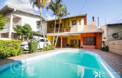 Casa com 4 quartos à venda na rua cacilda yaconis becker, 223, rubem berta, porto alegre, 300 m2 por r$ 693.500