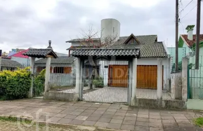 Casa com 4 quartos à venda na rua alfredo silveira dias, 36, nonoai, porto alegre, 294 m2 por r$ 1.300.000