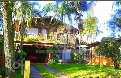 Casa com 3 quartos à venda na estrada joão vedana, 561, cavalhada, porto alegre, 200 m2 por r$ 905.000