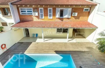 Casa em condomínio fechado com 4 quartos à venda na avenida juca batista, 1200, ipanema, porto alegre, 300 m2 por r$ 1.200.000