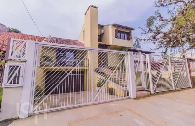 Casa com 3 quartos à venda na rua arnaldo bernardi, 60, ipanema, porto alegre, 298 m2 por r$ 1.100.000