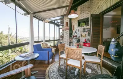 Casa em condomínio fechado com 4 quartos à venda na rua erechim, 100, nonoai, porto alegre, 331 m2 por r$ 1.050.000
