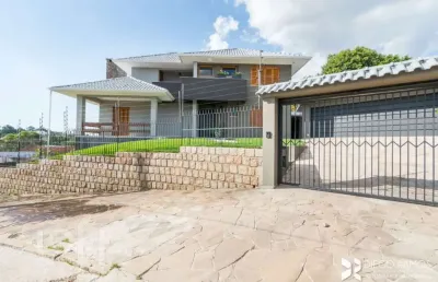 Casa com 3 quartos à venda na rua doutor paulino guerra, 362, jardim itu sabará, porto alegre, 258 m2 por r$ 1.290.000