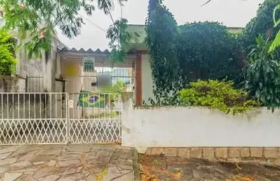 Casa com 4 quartos à venda na rua octávio de souza, 556, nonoai, porto alegre, 216 m2 por r$ 600.000