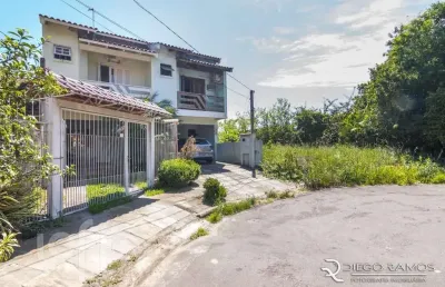 Casa com 2 quartos à venda na rua michael motta seelig, 58, hípica, porto alegre, 112 m2 por r$ 324.900