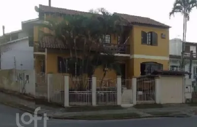 Casa com 3 quartos à venda na avenida celestino bertolucci, 115, hípica, porto alegre, 306 m2 por r$ 979.900