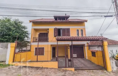 Casa com 4 quartos à venda na travessa clemêncio wallau, 24, coronel aparício borges, porto alegre, 484 m2 por r$ 780.000