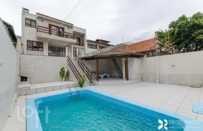 Casa com 4 quartos à venda na rua paul harris, 130, jardim itu sabará, porto alegre, 245 m2 por r$ 1.450.000