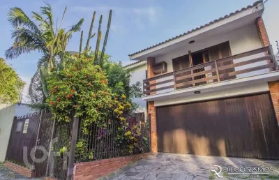 Casa com 4 quartos à venda na avenida panamericana, 940, jardim lindóia, porto alegre, 303 m2 por r$ 1.850.000