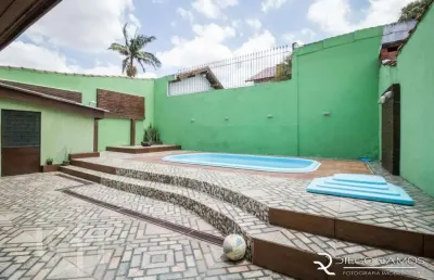 Casa com 3 quartos à venda na avenida benno mentz, 1717, vila ipiranga, porto alegre, 450 m2 por r$ 850.000