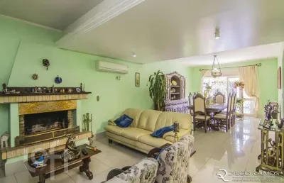 Casa com 4 quartos à venda na rua menezes paredes, 208, nonoai, porto alegre, 262 m2 por r$ 1.330.000