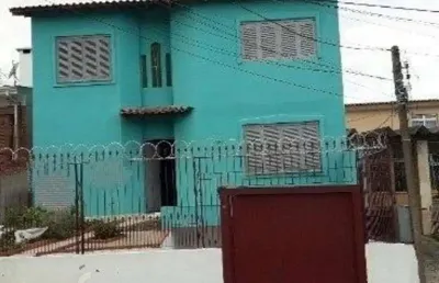Casa com 4 quartos à venda na avenida delmar rocha barbosa, 729, rubem berta, porto alegre, 220 m2 por r$ 530.000