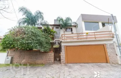 Casa com 4 quartos à venda na avenida da serraria, 742, espírito santo, porto alegre, 284 m2 por r$ 900.000