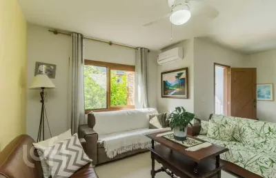 Casa com 4 quartos à venda na rua joão corrêa almeida, 45, vila nova, porto alegre, 244 m2 por r$ 627.000
