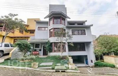 Casa em condomínio fechado com 3 quartos à venda na rua tocantins, 869, agronomia, porto alegre, 385 m2 por r$ 1.700.000
