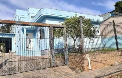 Casa com 5 quartos à venda na rua leão licurgo brasiliano arano, 125, vila nova, porto alegre, 312 m2 por r$ 850.000