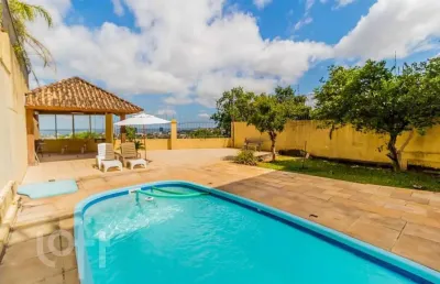 Casa com 4 quartos à venda na rua alcebíades antônio dos santos, 379, nonoai, porto alegre, 375 m2 por r$ 1.805.000