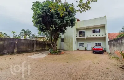 Casa com 3 quartos à venda na rua jerolomo minuzo, 464, vila nova, porto alegre, 331 m2 por r$ 799.000