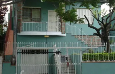 Casa com 3 quartos à venda na rua guilherme schell, 253, santo antônio, porto alegre, 233 m2 por r$ 731.500