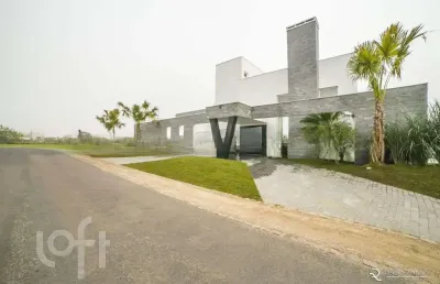 Casa em condomínio fechado com 5 quartos à venda na avenida juca batista, 8000, belém novo, porto alegre, 470 m2 por r$ 4.260.000