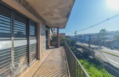 Casa com 4 quartos à venda na avenida coronel gastão haslocher mazeron, 447, medianeira, porto alegre, 140 m2 por r$ 427.405