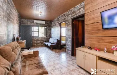 Casa com 4 quartos à venda na avenida vinte e um de abril, 1062, sarandi, porto alegre, 200 m2 por r$ 350.000
