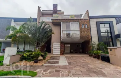 Casa em condomínio fechado com 3 quartos à venda na rua ivo walter kern, 599, hípica, porto alegre, 291 m2 por r$ 1.490.000