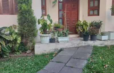 Casa com 2 quartos à venda na rua germano petersen júnior, 458, auxiliadora, porto alegre, 120 m2 por r$ 1.500.000