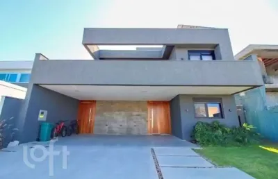 Casa em condomínio fechado com 4 quartos à venda na avenida juca batista, 9000, belém novo, porto alegre, 450 m2 por r$ 3.550.000