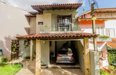 Casa em condomínio fechado com 3 quartos à venda na rua erechim, 100, nonoai, porto alegre, 187 m2 por r$ 750.000