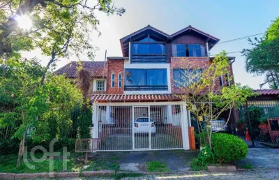 Casa com 3 quartos à venda na rua ponciano pacheco da silveira, 114, guarujá, porto alegre, 181 m2 por r$ 568.000