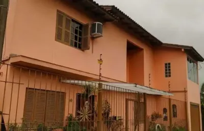 Casa com 4 quartos à venda na beco maria alice, 40, restinga, porto alegre, 300 m2 por r$ 477.000