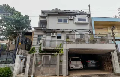 Casa com 4 quartos à venda na bortolo barbieri, 67, jardim são pedro, porto alegre, 400 m2 por r$ 1.650.000