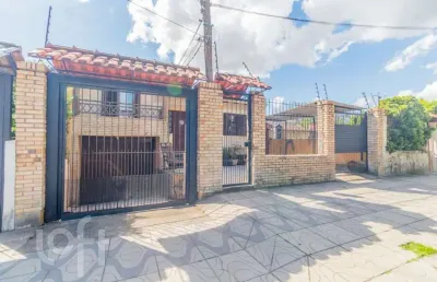 Casa com 4 quartos à venda na rua xavier da cunha, 581, nonoai, porto alegre, 193 m2 por r$ 689.000