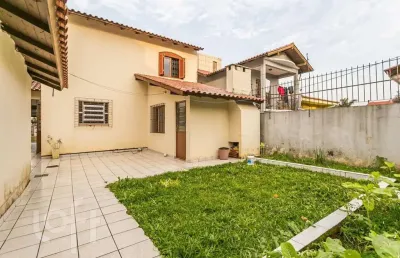 Casa com 3 quartos à venda na avenida doutor saulo coelho, 120, rubem berta, porto alegre, 120 m2 por r$ 585.000
