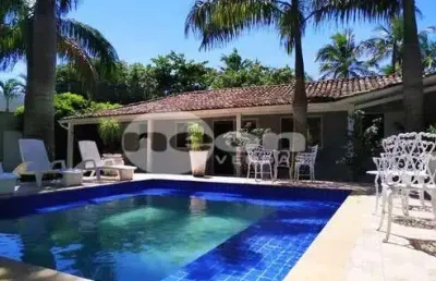 Casa com 4 quartos à venda na avenida das mangueiras, 618, balneário praia do pernambuco, guarujá, 280 m2 por r$ 1.150.000