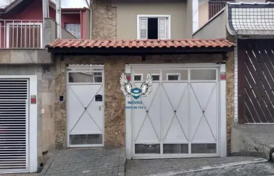 Sobrado com 03 dormitórios sendo 01 suíte e garagem para 05 vagas