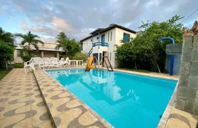 Casa em condomínio fechado com 6 quartos à venda na Rua Alameda Humaitá, 235, Guarajuba, Camaçari