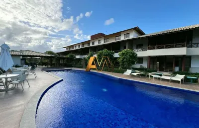 Lindo apto village 2/4 sendo 1 suíte pé na areia em itacimirim