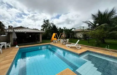 Casa em condomínio fechado com 4 quartos à venda na Rua Dos Laços, 963, Barra do Jacuípe, Camaçari