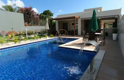 Vendo casa com 4/4 -  condomínio parque do jacuípe - casa alto padrão