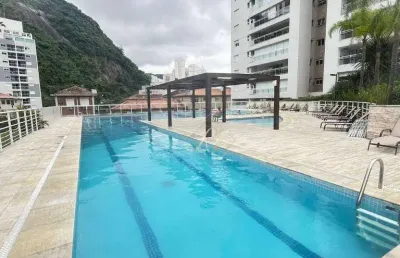 Prédio estilo clube, apartamento com 4 dormitórios, varanda gourmet com churrasqueira, sol da manhã e tarde, bem próximo da praia na cidade de santos!