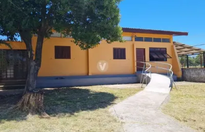 Excelente casa de esquina  de 5 dormitórios , 4 banheiros, garagem fechada para