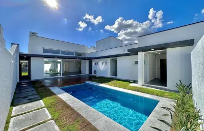 Casa alto padrão toda térrea com 3 suítes, escritório e piscina no condomínio vi